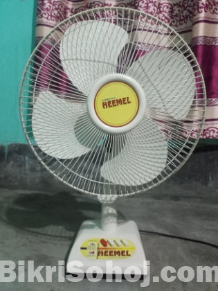 সুন্দর একটি হিমেল টেবিল ফ্যান বিক্রি হবে।